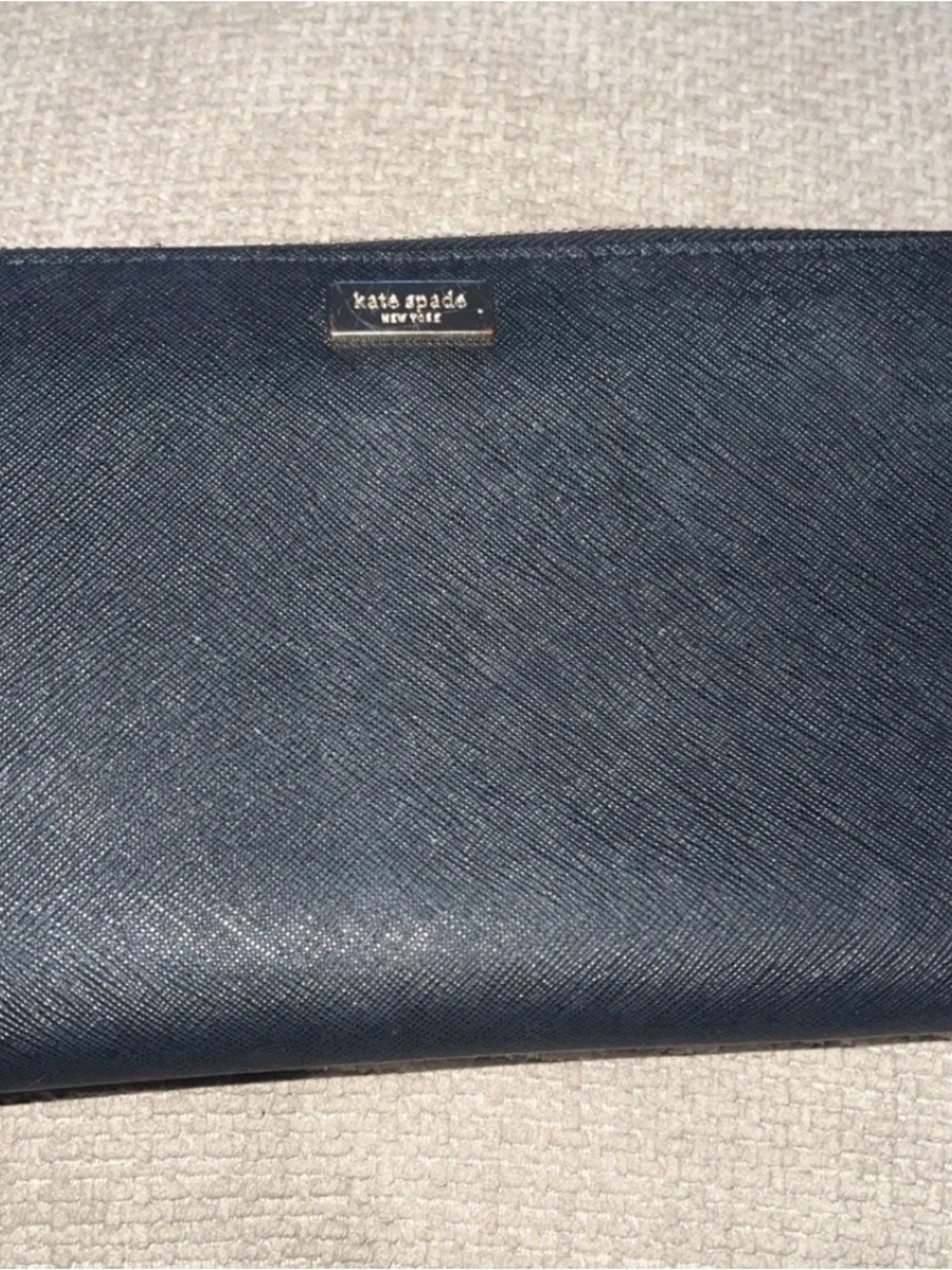 kate spade black saffiano wallet with gold logo plaque